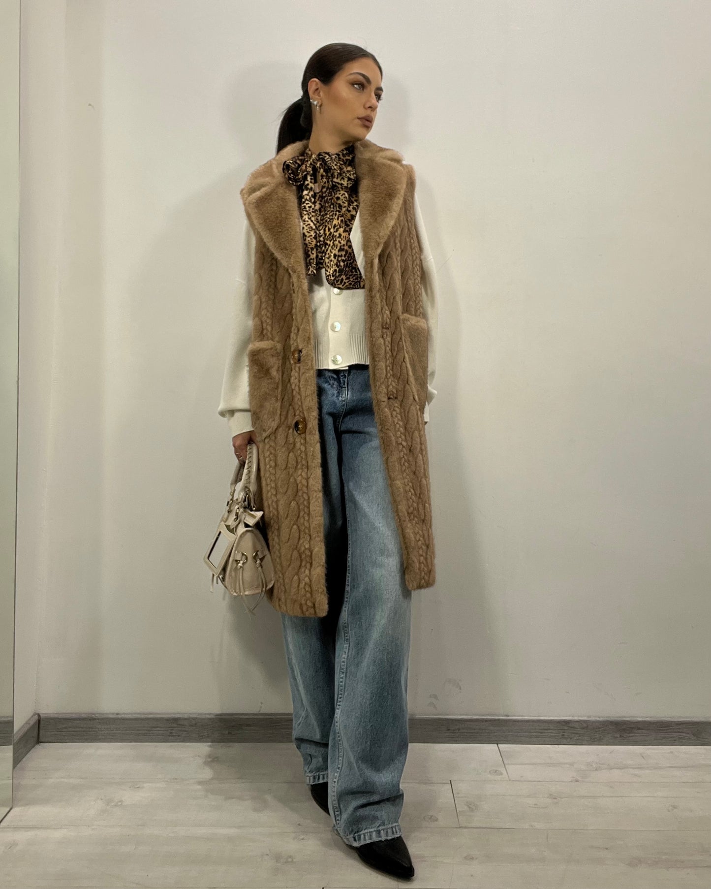 Smanicato ecopelliccia trecce